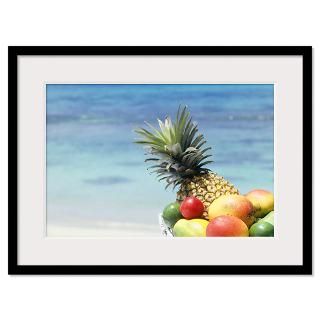 Bowl of tropical fruit, sea in background