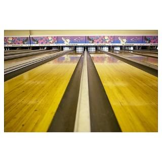 Three bowling balls in bowling alley Poster