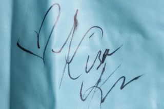 Kira Kener Autographed Turquois Mini Skirt Lowrider Magazine Shoot