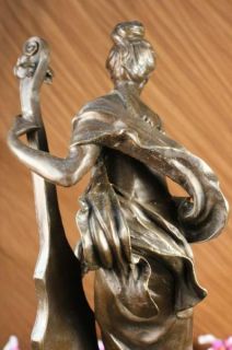 Agathon Leonard A Young Woman Plays A Soothing Song on Cello Bronze