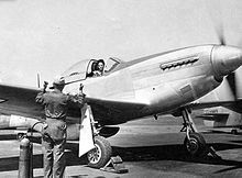 Florene Watson preparing a P 51D 5NA for a ferry flight from the