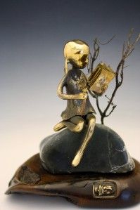 BRONZE OF A YOUNG GIRL READING A BOOK BY MALCOLM MORAN 