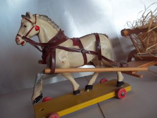 This is a beautiful white wooden horse from the 1930s Still in good