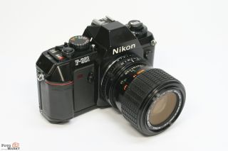 Nikon F 301 SLR + Objektiv 2,8 4 Sigma 35 70mm + Blitz Regula Variant