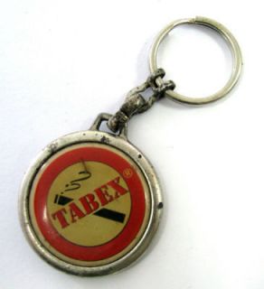 OLD USED ADVERTISING KEYCHAIN TABEX SOPHARMA LOGO SEE»